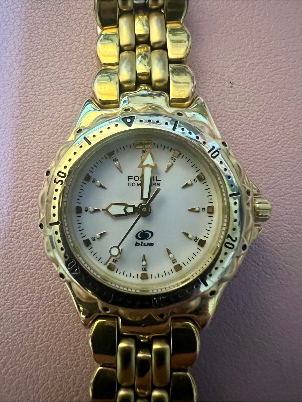Ladies gold Fossil bracelet watch